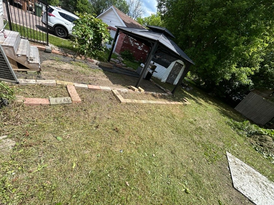 Backyard patio area after cleanup